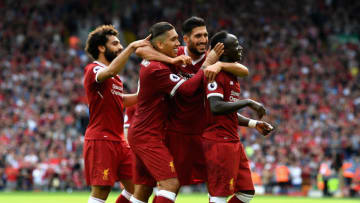 LIVERPOOL, ENGLAND - AUGUST 27: Sadio Mane of Liverpool celebrates scoring his sides second goal with his Liverpool team mates during the Premier League match between Liverpool and Arsenal at Anfield on August 27, 2017 in Liverpool, England. (Photo by Michael Regan/Getty Images)