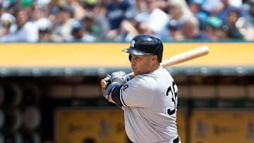 May 22, 2016; Oakland, CA, USA; New York Yankees designated hitter Carlos Beltran (36) hits a single against the Oakland Athletics during the sixth inning at the Oakland Coliseum. Mandatory Credit: Kelley L Cox-USA TODAY Sports