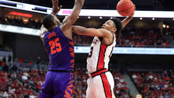 LOUISVILLE, KENTUCKY - JANUARY 25: David Johnson #13 of the Louisville Cardinals shoots the ball against the Clemson Tigers at KFC YUM! Center on January 25, 2020 in Louisville, Kentucky. (Photo by Andy Lyons/Getty Images)