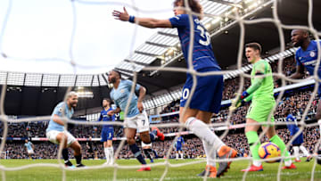 MANCHESTER, ENGLAND - FEBRUARY 10: Raheem Sterling of Manchester City celebrates after scoring his team's first goal as David Luiz and Kepa Arrizabalaga of Chelsea react during the Premier League match between Manchester City and Chelsea FC at Etihad Stadium on February 10, 2019 in Manchester, United Kingdom. (Photo by Laurence Griffiths/Getty Images)