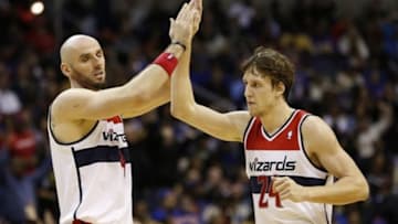 Nov 23, 2013; Washington, DC, USA; Washington Wizards center Marcin Gortat (4) celebrates with Wizards power forward Jan Vesely (24) against the New York Knicks in the fourth quarter at Verizon Center. The Wizards won 98-89. Mandatory Credit: Geoff Burke-USA TODAY Sports