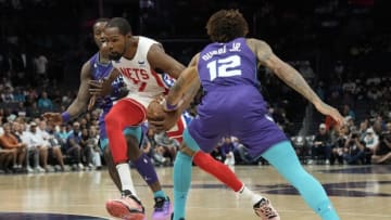 Nov 5, 2022; Charlotte, North Carolina, USA; Brooklyn Nets forward Kevin Durant (7) drives to the basket against Charlotte Hornets guard Kelly Oubre Jr. (12) during the first quarter at Spectrum Center. Mandatory Credit: Jim Dedmon-USA TODAY Sports