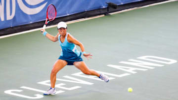 CLEVELAND, OH - AUGUST 25: Nagi Hanatani of Japan returns a serve to Katerina Siniakova of the Czech Republic during the first set of their match on day 4 of the Cleveland Championships at Jacobs Pavilion on August 25, 2021 in Cleveland, Ohio. (Photo by Lauren Bacho/Getty Images)