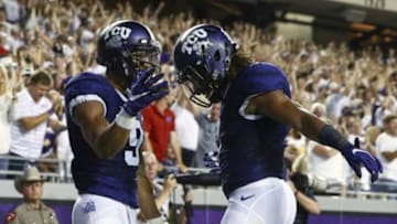Sep 19, 2015; Fort Worth, TX, USA; TCU Horned Frogs wide receiver Josh Doctson (9) celebrates with wide receiver Kolby Listenbee (right) after catching a touchdown pass against the Southern Methodist Mustangs during the first half at Amon G. Carter Stadium. Mandatory Credit: Kevin Jairaj-USA TODAY Sports