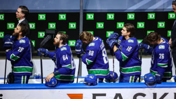 EDMONTON, ALBERTA - SEPTEMBER 03: The Vancouver Canucks stand for the national anthem prior to Game Six of the Western Conference Second Round against the Vegas Golden Knights during the 2020 NHL Stanley Cup Playoffs at Rogers Place on September 03, 2020 in Edmonton, Alberta, Canada. (Photo by Bruce Bennett/Getty Images)