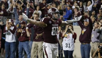 COLLEGE STATION, TEXAS - NOVEMBER 24: Jace Sternberger #81 of the Texas A&M Aggies scores on a 10 yard pass during the second quarter as Grant Delpit #9 of the LSU Tigers is unable to make the stop at Kyle Field on November 24, 2018 in College Station, Texas. (Photo by Bob Levey/Getty Images)
