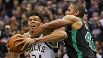 MILWAUKEE, WI - APRIL 22: Giannis Antetokounmpo #34 of the Milwaukee Bucks drives against Al Horford #42 of the Boston Celtics during Game Four of Round One of the 2018 NBA Playoffs at the Bradley Center on April 22, 2018 in Milwaukee, Wisconsin. The Bucks defeated the Celtics 104-102. NOTE TO USER: User expressly acknowledges and agrees that, by downloading and or using this photograph, User is consenting to the terms and conditions of the Getty Images License Agreement. (Photo by Jonathan Daniel/Getty Images)