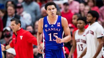 LUBBOCK, TEXAS - JANUARY 03: Guard Kevin McCullar #15 of the Kansas Jayhawks runs across the court during the second half of the college basketball game against the Texas Tech Red Raiders at United Supermarkets Arena on January 03, 2023 in Lubbock, Texas. (Photo by John E. Moore III/Getty Images)