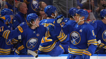 Oct 19, 2023; Buffalo, New York, USA; Buffalo Sabres defenseman Erik Johnson (6) celebrates his goal with teammates during the first period against the Calgary Flames at KeyBank Center. Mandatory Credit: Timothy T. Ludwig-USA TODAY Sports