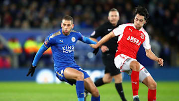 LEICESTER, ENGLAND - JANUARY 16: Islam Slimani of Leicester City evades Markus Schwabl of Fleetwood Town during The Emirates FA Cup Third Round Replay match between Leicester City and Fleetwood Town at The King Power Stadium on January 16, 2018 in Leicester, England. (Photo by Julian Finney/Getty Images )