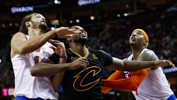 Oct 25, 2016; Cleveland, OH, USA; Cleveland Cavaliers center Tristan Thompson (13) fight for position with with New York Knicks center Joakim Noah (13) and forward Carmelo Anthony (7) in the first half at Quicken Loans Arena. Mandatory Credit: Rick Osentoski-USA TODAY Sports