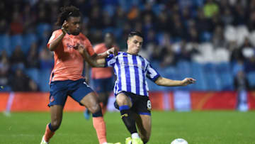 SHEFFIELD, ENGLAND - SEPTEMBER 24: Joey Pelupessy of Sheffield Wednesday and Alex Iwobi of Everton in action during the Carabao Cup Third Round match between Sheffield Wednesday and Everton at Hillsborough on September 24, 2019 in Sheffield, England. (Photo by Nathan Stirk/Getty Images)
