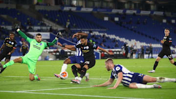 Manchester City's Algerian midfielder Riyad Mahrez (C) puts the ball wide during the English Premier League football match between Brighton and Hove Albion and Manchester City at the American Express Community Stadium in Brighton, southern England on July 11, 2020. (Photo by Julian Finney / POOL / AFP) / RESTRICTED TO EDITORIAL USE. No use with unauthorized audio, video, data, fixture lists, club/league logos or 'live' services. Online in-match use limited to 120 images. An additional 40 images may be used in extra time. No video emulation. Social media in-match use limited to 120 images. An additional 40 images may be used in extra time. No use in betting publications, games or single club/league/player publications. / (Photo by JULIAN FINNEY/POOL/AFP via Getty Images)