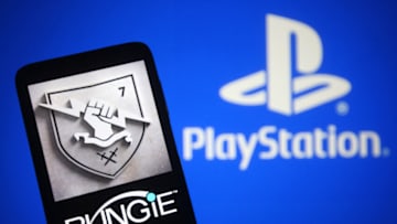 UKRAINE - 2022/02/02: In this photo illustration, a Bungie Inc. logo of a video game developer is seen on a smartphone screen and PlayStation (PS) logo in the background. (Photo Illustration by Pavlo Gonchar/SOPA Images/LightRocket via Getty Images)