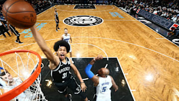 BROOKLYN, NY - JANUARY 1, 2018: Jarrett Allen #31 of the Brooklyn Nets shoots the ball against the Orlando Magic on January 1, 2018 at Barclays Center in Brooklyn, New York. NOTE TO USER: User expressly acknowledges and agrees that, by downloading and or using this Photograph, user is consenting to the terms and conditions of the Getty Images License Agreement. Mandatory Copyright Notice: Copyright 2018 NBAE (Photo by Nathaniel S. Butler/NBAE via Getty Images)