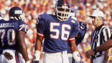 PASADENA - JANUARY 25 : Linebacker Lawrence Taylor #56 of the New York Giants looks over to the sideline against the Denver Broncos in Super Bowl XXlI at the Rose Bowl on January 25, 1987 in Pasadena, California. The Giants defeated the Broncos 39-20. (Photo by Nate Fine/Getty Images)