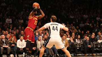 Jan 6, 2017; Brooklyn, NY, USA; Cleveland Cavaliers forward LeBron James (23) shoots the ball over Brooklyn Nets guard Bojan Bogdanovic (44) during the first quarter at Barclays Center. Mandatory Credit: Anthony Gruppuso-USA TODAY Sports