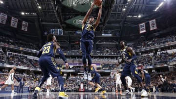INDIANAPOLIS, IN - FEBRUARY 13: Thaddeus Young #21 of the Indiana Pacers grabs a rebound against the Milwaukee Bucks during the game at Bankers Life Fieldhouse on February 13, 2019 in Indianapolis, Indiana. The Bucks won 106-97. NOTE TO USER: User expressly acknowledges and agrees that, by downloading and or using the photograph, User is consenting to the terms and conditions of the Getty Images License Agreement. (Photo by Joe Robbins/Getty Images)