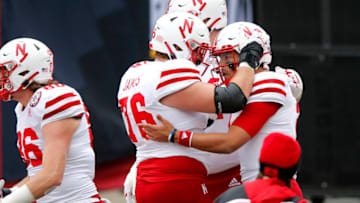 Oct 24, 2020; Columbus, Ohio, USA; Nebraska Cornhuskers quarterback Adrian Martinez (2) celebrates his touchdown with offensive lineman Brenden Jaimes (76)during the first quarter against the Ohio State Buckeyes at Ohio Stadium. Mandatory Credit: Joseph Maiorana-USA TODAY Sports