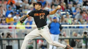 Jun 13, 2015; Omaha, NE, USA; Miami Hurricanes pitcher Danny Garcia (14) pitches in the 2015 College World Series at TD Ameritrade Park. Mandatory Credit: Steven Branscombe-USA TODAY Sports