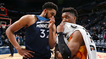 MINNEAPOLIS, MN - JANUARY 27: Karl-Anthony Towns #32 of the Minnesota Timberwolves and Donovan Mitchell #45 of the Utah Jazz speak after the game on January 27, 2019 at Target Center in Minneapolis, Minnesota. Copyright 2019 NBAE (Photo by David Sherman/NBAE via Getty Images)