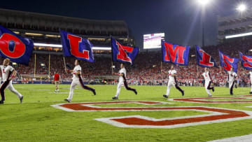 OXFORD, MS - OCTOBER 29: Mississippi Rebels cheerleaders celebrate after a touchdown during the 2nd half of an NCAA college football game against the Auburn Tigers on October 29, 2016 in Oxford, Mississippi. (Photo by Butch Dill/Getty Images)