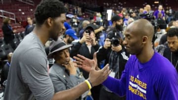 Dec 1, 2015; Philadelphia, PA, USA; Philadelphia 76ers center Joel Embiid (L) greets Los Angeles Lakers forward Kobe Bryant (R) before game action at Wells Fargo Center. Mandatory Credit: Bill Streicher-USA TODAY Sports