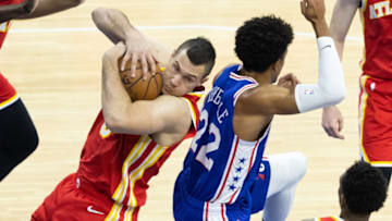 Jun 8, 2021; Philadelphia, Pennsylvania, USA; Atlanta Hawks forward Danilo Gallinari (8) rebounds the ball in front of Philadelphia 76ers guard Matisse Thybulle (22) during the first quarter in game two of the second round of the 2021 NBA Playoffs at Wells Fargo Center. Mandatory Credit: Bill Streicher-USA TODAY Sports