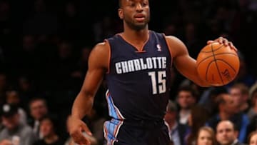 Feb 12, 2014; Brooklyn, NY, USA; Charlotte Bobcats point guard Kemba Walker (15) advances the ball during the first quarter against the Brooklyn Nets at Barclays Center. Mandatory Credit: Anthony Gruppuso-USA TODAY Sports