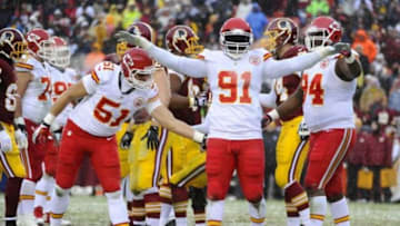 Dec 8, 2013; Landover, MD, USA; Kansas City Chiefs linebacker Tamba Hali (91) celebrates after sacking Washington Redskins quarterback Robert Griffin III (not shown) during the second quarter at FedEx Field. Mandatory Credit: Brad Mills-USA TODAY Sports