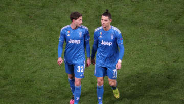 LYON, FRANCE-FEBRUARY 26: Federico Bernardeschi and Cristiano Ronaldo of Juventus are disspointed after the UEFA Champions League round of 16 first leg match between Olympique Lyon and Juventus at Parc Olympique on February 26, 2020 in Lyon, France. (Photo by Xavier Laine/Getty Images)