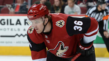 GLENDALE, AZ - MARCH 01: Christian Fischer #36 of the Arizona Coyotes gets ready during a faceoff against the Minnesota Wild at Gila River Arena on March 1, 2018 in Glendale, Arizona. (Photo by Norm Hall/NHLI via Getty Images)