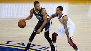 OAKLAND, CA - JUNE 03: Stephen Curry #30 of the Golden State Warriors drives against George Hill #3 of the Cleveland Cavaliers in Game 2 of the 2018 NBA Finals at ORACLE Arena on June 3, 2018 in Oakland, California. NOTE TO USER: User expressly acknowledges and agrees that, by downloading and or using this photograph, User is consenting to the terms and conditions of the Getty Images License Agreement. (Photo by Thearon W. Henderson/Getty Images)