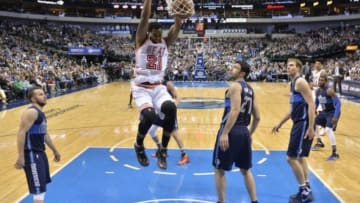 Feb 3, 2016; Dallas, TX, USA; Miami Heat center Hassan Whiteside (21) dunks the ball against the Dallas Mavericks during the game at the American Airlines Center. The Heat defeat the Mavericks 93-90. Mandatory Credit: Jerome Miron-USA TODAY Sports