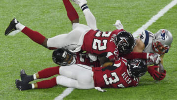 HOUSTON, TX - FEBRUARY 05: Julian Edelman #11 of the New England Patriots catches the pass over Keanu Neal #22 and Ricardo Allen #37 of the Atlanta Falcons during Super Bowl 51 at NRG Stadium on February 5, 2017 in Houston, Texas. The Patriots defeat the Atlanta Falcons 34-28 in overtime. (Photo by Focus on Sport/Getty Images)
