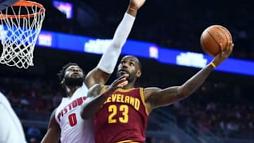 Nov 17, 2015; Auburn Hills, MI, USA; Detroit Pistons center Andre Drummond (0) guards Cleveland Cavaliers forward LeBron James (23) during the first quarter at The Palace of Auburn Hills. Mandatory Credit: Tim Fuller-USA TODAY Sports