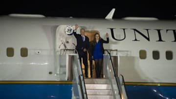 Who is the guy getting off the fancy plane? Don't ask basketball players at the University of Maryland. They don't know, either. State Department photo by William Ng/Public Domain