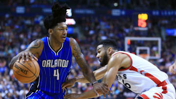 TORONTO, ON - MARCH 27: Elfrid Payton #4 of the Orlando Magic dribbles the ball as Cory Joseph #6 of the Toronto Raptors defends during the first half of an NBA game at Air Canada Centre on March 27, 2017 in Toronto, Canada. NOTE TO USER: User expressly acknowledges and agrees that, by downloading and or using this photograph, User is consenting to the terms and conditions of the Getty Images License Agreement. (Photo by Vaughn Ridley/Getty Images)