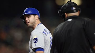 Apr 13, 2016; Houston, TX, USA; Kansas City Royals third baseman Mike Moustakas (8) has words with home plate umpire Eric Cooper after striking out during the seventh inning against the Houston Astros at Minute Maid Park. Mandatory Credit: Troy Taormina-USA TODAY Sports