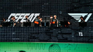 BUSAN, SOUTH KOREA - MAY 20: Teams G2 Esports and T1 greet each other onstage after their match at the League of Legends - Mid-Season Invitational Rumble Stage on May 20, 2022 in Busan, South Korea. (Photo by Lee Aiksoon/Riot Games)