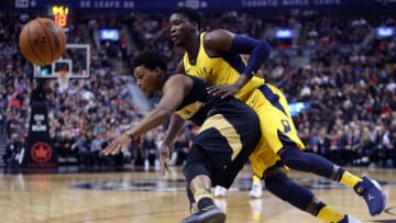 Victor Oladipo and Kyle Lowry of the Miami Heat(Photo by Vaughn Ridley/Getty Images)