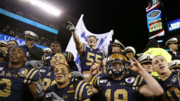 PHILADELPHIA, PENNSYLVANIA - DECEMBER 14: The Navy Midshipmen celebrate the win over the Army Black Knights at Lincoln Financial Field on December 14, 2019 in Philadelphia, Pennsylvania.The Navy Midshipmen defeated the Army Black Knights 31-7. (Photo by Elsa/Getty Images)