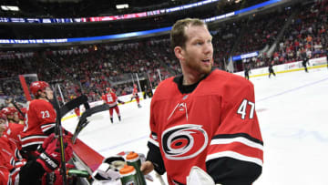 RALEIGH, NORTH CAROLINA - FEBRUARY 16: James Reimer #47 of the Carolina Hurricanes comes to the bench during a timeout in the second period against the Edmonton Oilers at PNC Arena on February 16, 2020 in Raleigh, North Carolina. (Photo by Grant Halverson/Getty Images)