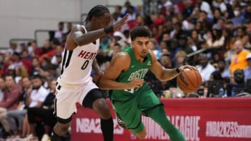 Boston Celtics guard Brodric Thomas (97) dribbles against Miami Heat guard Marcus Garrett (0) during an NBA Summer League( Stephen R. Sylvanie-USA TODAY Sports)