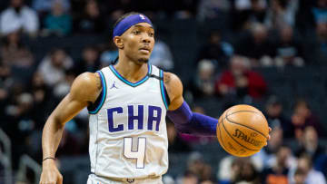 CHARLOTTE, NORTH CAROLINA - FEBRUARY 08: Devonte' Graham #4 of the Charlotte Hornets with the ball during the third quarter during their game against the Dallas Mavericks at Spectrum Center on February 08, 2020 in Charlotte, North Carolina. NOTE TO USER: User expressly acknowledges and agrees that, by downloading and/or using this photograph, user is consenting to the terms and conditions of the Getty Images License Agreement. (Photo by Jacob Kupferman/Getty Images)