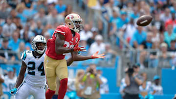 CHARLOTTE, NC - SEPTEMBER 18: Torrey Smith #82 of the San Francisco 49ers makes a touchdown catch against James Bradberry #24 of the Carolina Panthers during the game at Bank of America Stadium on September 18, 2016 in Charlotte, North Carolina. (Photo by Grant Halverson/Getty Images)