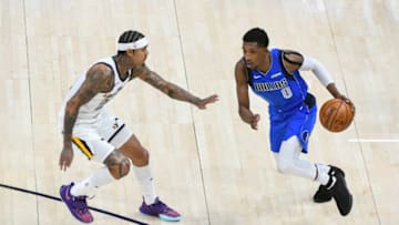 SALT LAKE CITY, UT - JANUARY 27: Josh Richardson #0 of the Dallas Mavericks drives past Jordan Clarkson #00 of the Utah Jazz during a game at Vivint Smart Home Arena on January 27, 2021 in Salt Lake City, Utah. NOTE TO USER: User expressly acknowledges and agrees that, by downloading and/or using this photograph, user is consenting to the terms and conditions of the Getty Images License Agreement. (Photo by Alex Goodlett/Getty Images)