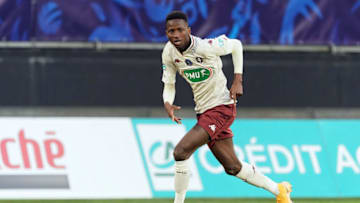 VALENCIENNES, FRANCE - MARCH 06: Pape Matar Sarr of FC Metz runs with the ball during Coupe de France, round of 32, Valenciennes FC (VAFC) vs Metz FC on March 6, 2021 at Hainaut Stadium in Valenciennes, France. (Photo by Sylvain Lefevre/Getty Images)