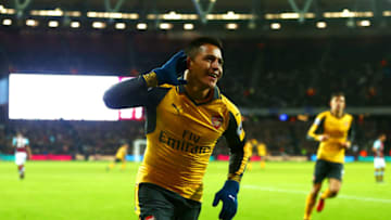 LONDON, ENGLAND - DECEMBER 03: Alexis Sanchez of Arsenal celebrates after scoring his team's second goal during the Premier League match between West Ham United and Arsenal at London Stadium on December 3, 2016 in London, England. (Photo by Jordan Mansfield/Getty Images)