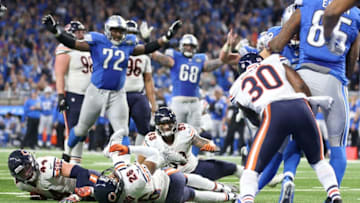 DETROIT, MI - DECEMBER 11: The Detroit Lions celebrate as quarterback Matthew Stafford #9 of the Detroit Lions scrambles for a touchdown against the Chicago Bears during fourth quarter action at Ford Field on December 11, 2016 in Detroit, Michigan. (Photo by Leon Halip/Getty Images)